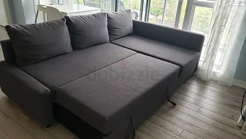 Grey L-shaped Sofa Bed with Storage - Good Condition