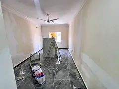 Two-bedroom apartment with a living room in Al Rawda 3, Al Salam Street, near Al Muwaihat Roundabout