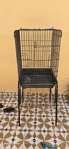 Large metal bird cage on stand — good condition