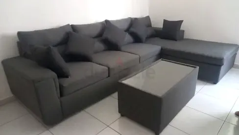 Dark Grey L-shaped Sofa with Ottoman and Coffee Table