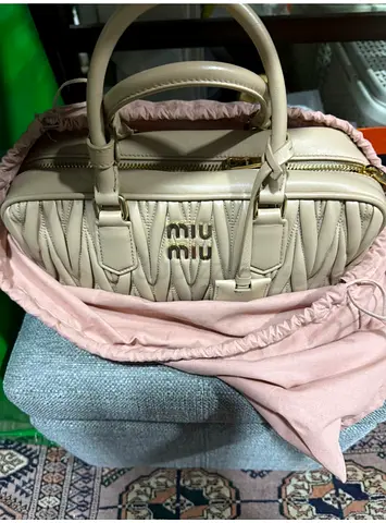Miu Miu Matelassé Leather Top-Handle Bag - Beige