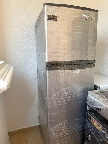 Used Silver Double-Door Refrigerator - Good Working Condition