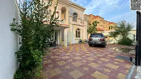Investment villa for sale in Al Muwaihat 1 | 5,000 sq ft | 5 master bedrooms | Majlis and 2 living r