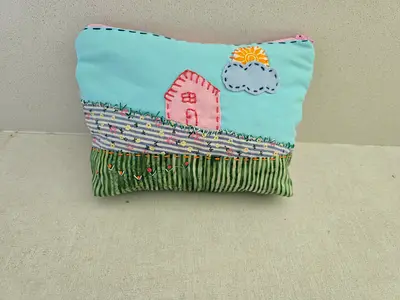Handmade pouch with Embroidered House Design