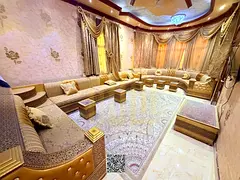 Luxury villa for sale in Al Muwaihat 2, 5 master bedrooms, price includes electricity, water, and ai