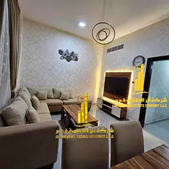 Luxury two-bedroom apartment with a living room and balcony. Ajman Corniche. Fully furnished. For mo