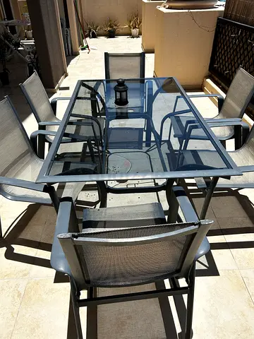 Modern Aluminium Outdoor Dining Set with Glass Top Table and 6 Chairs. Rust free 100% aluminium.