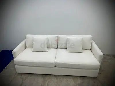 Still brand new cratebarrel three seater sofa