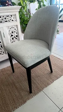 Light grey Crate and Barrel upholstered dining chair with black legs - good condition
