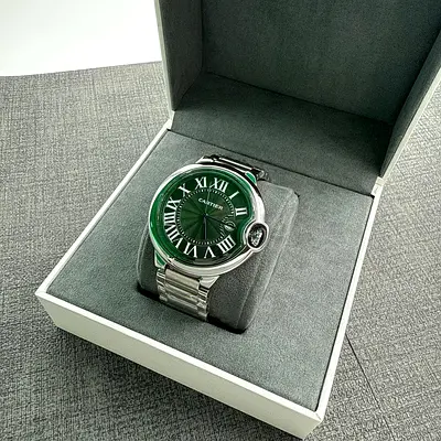Cartier Ballon Bleu-style mens wristwatch — stainless steel, green dial