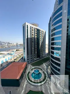 Prime furnished 1BR Orient Tower Al Rashidiya 1 partial creek view near Corniche and services ready