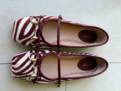 Gucci womens zebra print leather flats with horsebit detail, size EU 38