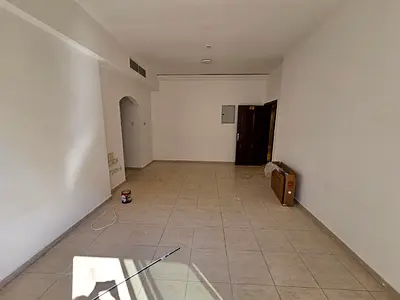 Two bedroom apartment for annual rent in Al Qasimia Al Nad with balcony open view free gym and swimming pool and prime location