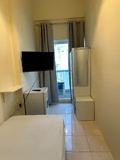 Available single partition with balcony and smart tv and fridge in sports city