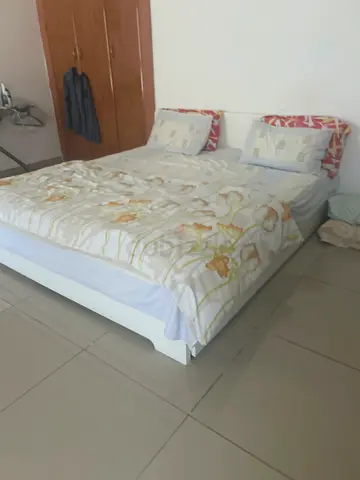 King size bed frame with four drawers - excellent condition