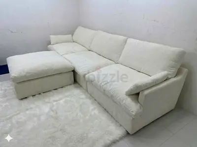 Very comfortable home center feather 🪶 filled modular sofa with ottoman