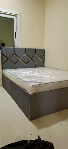 Grey Upholstered Double Bed with mattress and Elegant Headboard
