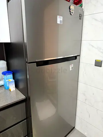 Good condition Samsung top-freezer refrigerator - 2-door, stainless steel finish