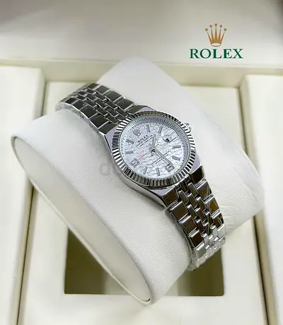 Rolex stainless steel ladies watch with textured silver dial