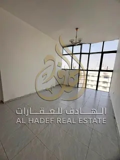 Luxury two-bedroom family apartment for annual rent in Sharjah, Abu Shagara area, strategically loca