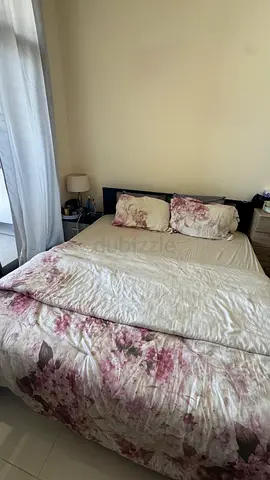 Comfortable king size Bed Frame with mattress and matching side table for sale!