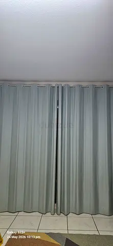 Light blue blackout curtains (pair) — good condition