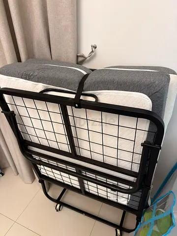 Foldable single guest bed frame with mattress - good condition