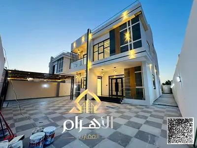 Villa for sale in Al Rawda, Ajman. Prime location, 5000 sq ft, 6 bedrooms, modern design and luxurious finishes. Suitable for living and investment.