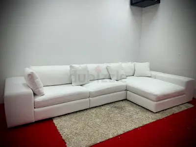 Like new condition eichholtz brand lshape sofa