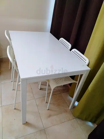 White IKEA-style Dining Table with 4 Matching Chairs