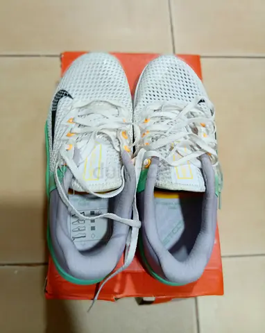 White Nike running shoes - lightly used, size available