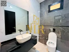 Furnished villa for sale in Al Amrah, Ajman. The price includes electricity, water, and air conditio