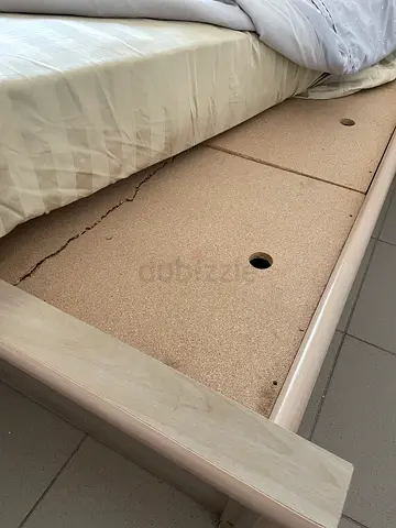 Queen size wooden bed frame with headboard (used, needs minor repair)