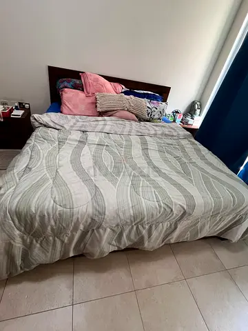 Queen size bed frame with mattress and headboard