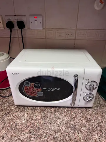 Compact white countertop microwave oven - good condition