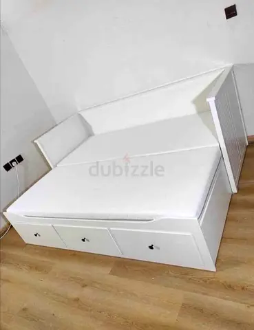 IKEA Hamnes day bed with 3 big storage drawers underneath and with 2 IKEA mattresses is available in