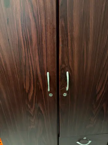 Dark wood wardrobe / armoire in good condition