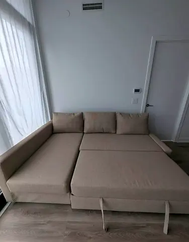 Beige L-shaped Sofa Bed with Chaise - Good Condition
