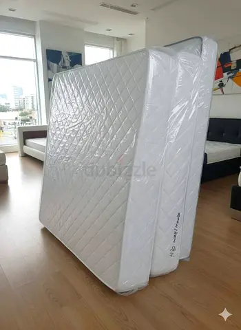 Brand new double/queen mattress (still wrapped) - firm
