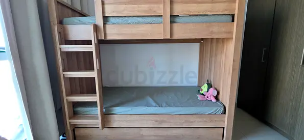 Fine quality wooden bunk bed with storage/trundle