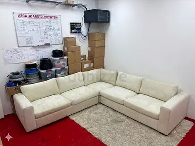 Expensive quality pottery barn beige color corner sofa