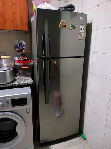 LG Silver Top-Freezer Refrigerator — Good Condition, 2-Door