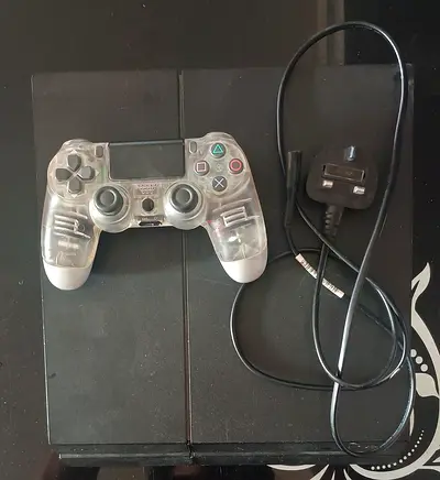 PS4 1TB SSD + Controller  650 AED Fixed