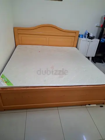 Solid wooden double bed frame with mattress and side tables included