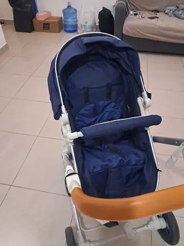 Blue luxury reversible baby stroller/pram - good condition