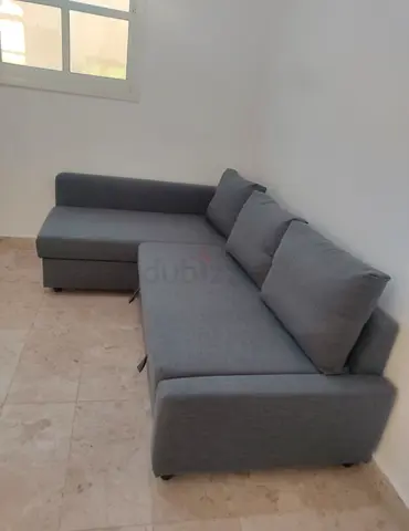 Ikea L Shape Sofa cum bed with big storage in L