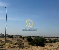 Residential land for sale in Al-Hawshi area, prime corner location on two streets and near the park.