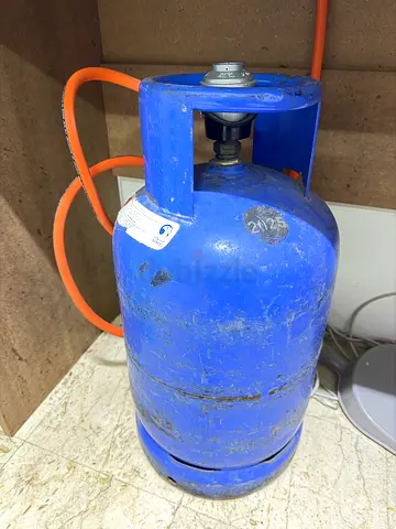 Used blue LPG gas cylinder with hose (good working condition)