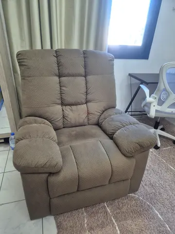 Single greenish beige fabric rocking recliner armchair - in excellent condition