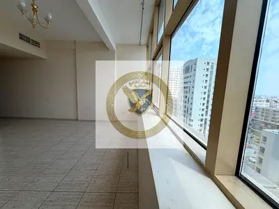 1BR hall with partition, open view, AC on landlord, free yearly maintenance, easy access to Dubai.